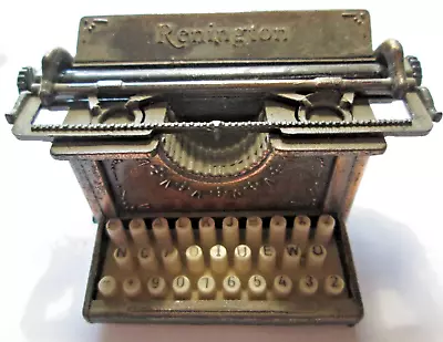 Vintage Die Cast Miniature Pencil Sharpener  Renington  Typewriter 3 X1.5 X1.75  • $6.50