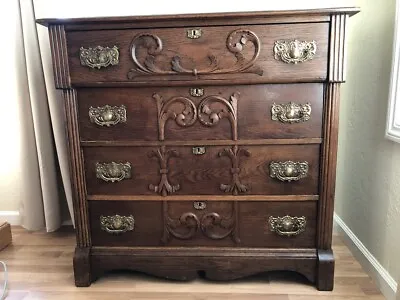 Eastlake Four Drawer Oak With Walnut Stain Dresser With Relief & Brass Hardware • $450