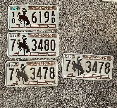 Wyoming Vintage License Plate Lot Of 4 Embossed Bucking Horse Steamboat Buckrail • $24