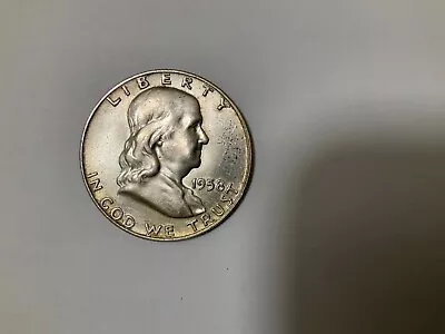 1958-D Franklin Half Dollar Uncirculated With Toning • $22.50