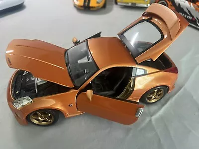 NEW Maisto Special Edition 1:18 Nissan 350Z Nismo S-tune Orange Bronze Copper • $50