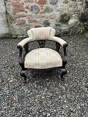 An Edwardian Tub Chair / Horseshoe Armchair • £140