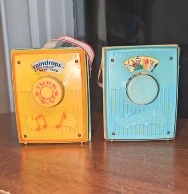 2 Fisher Price Music Box Pocket Radio Raindrop Falling & Small World - 1 Working • $14