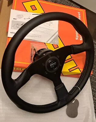Momo Steering Wheel & Quick Release Combo  • $175