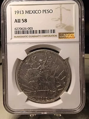 Mexico One Peso Caballito 1913 NGC AU 58 • $650