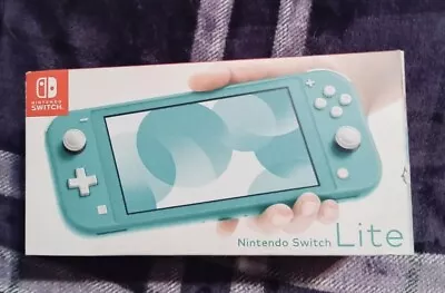 Nintendo Switch Lite Handheld Console - Turquoise • $180.50