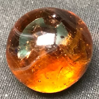 MASTER MARBLE Transparent Amber Melon Marble .662  To .685  M- • $1.95