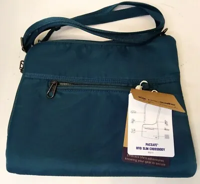 Pacsafe Women's Rfid Blocking Anti-Theft Slim Crossbody Bag- Teal • $37.79