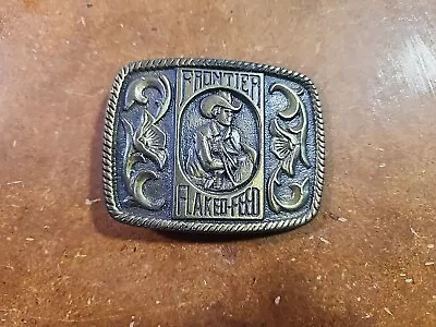 Vintage 1970's FRONTIER FLAKED FEED Belt Buckle Brass Monarch Feed Mills... • $10.50