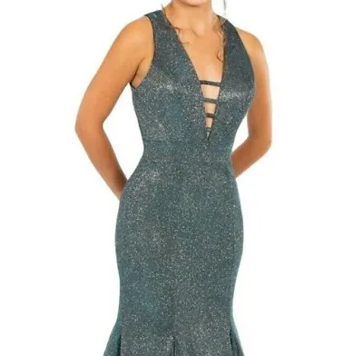 £100 • Buy Brand New Size 6 Teal Sparkly Metallic Open Back Mermaid Prom Dress