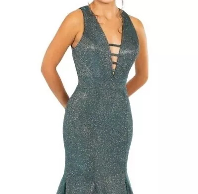 £100 • Buy Brand New Size 6 Teal Sparkly Metallic Open Back Mermaid Prom Dress