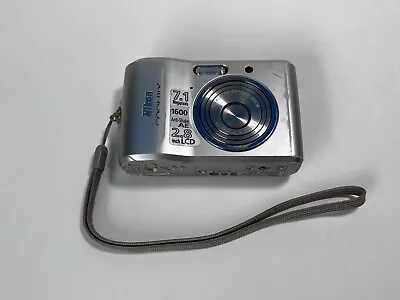 Nikon COOLPIX L16 7.1MP Silver Digital Camera - For Parts Not Working • $11.45