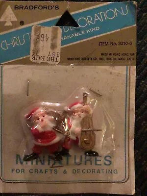 Vintage Minitatures Two Santa Cluase Playing Instruments In Original Package • $3.50