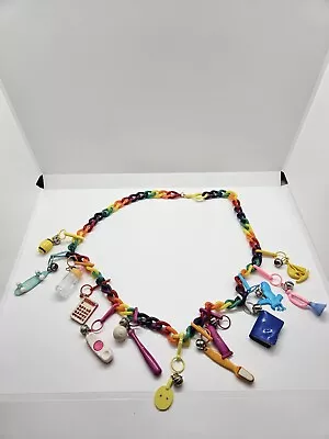 Vintage 80s Rainbow Plastic Charm Necklace 13 Charms Toothbrush Baby Bottle  • $50