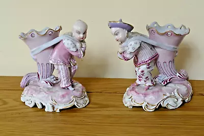 Pair Of Chinese Vase Figures • £21