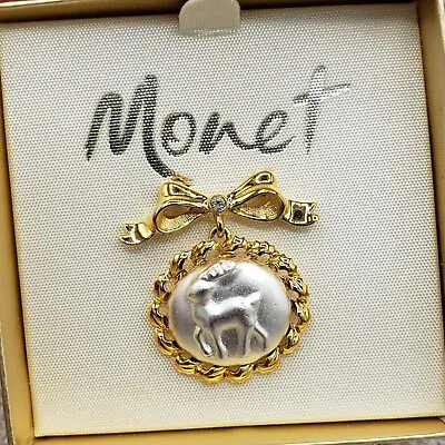 Vintage Christmas Reindeer Brooch Two Tone Hanging Bow Signed Monet Pin • $16