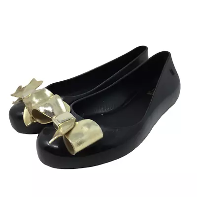 Mel Dreamed By Melissa Girls Space Love Ii Ballet Flats 1 Bow Slip On Black Gold • $15