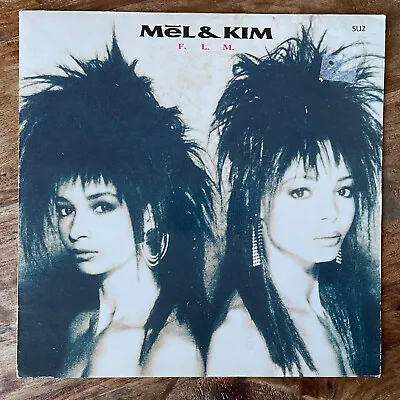 MEL & KIM - F.L.M.   EX(sleeve)/ EX+ VINYL LP / LYRIC INNER / FIRST PRESSING • £8.50