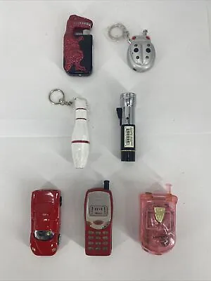 LOT OF 7 Vintage   Refillable Butane Lighters Car Bug Phone Dinosaur Bowling Pin • $18.52