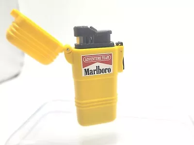 VINTAGE 80s MARLBORO ADVENTURE TEAM YELLOW HARDSHELL BUTANE LIGHTER • $12.99