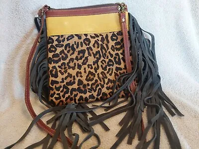 BOHO Fringe And Leather Leopard Cowhide Crossbody Bag With Vintage Rose Lining. • $19.99