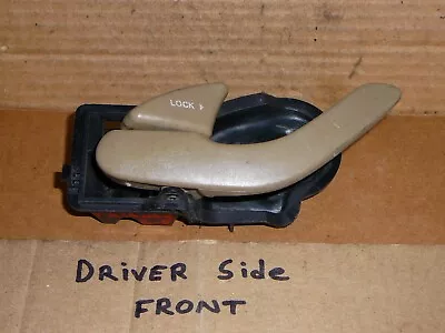 2003 Mazda Tribute LEFT FRONT Driver Side Inside Door Handle Tan Color OEM • $15.76