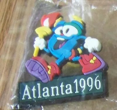 Atlanta 1996 Olympics Olympic Izzy Mascot Carrying The Torch PVC Lapel Pin • $10