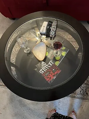 Round Tempered Glass Cocktail Table - Dark Wood. Wheels Not Visible..Gently Used • $175
