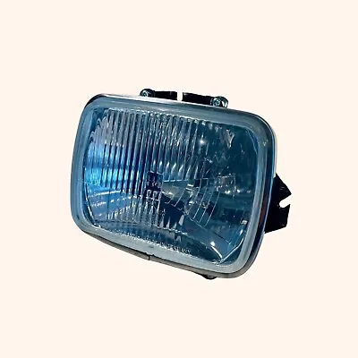 International 2013807C91 Hella 1AE 003 427-02 Halogen H4/T4W Headlamp. • $25