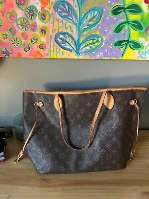 Louis Vuitton Neverfull Bag • $500