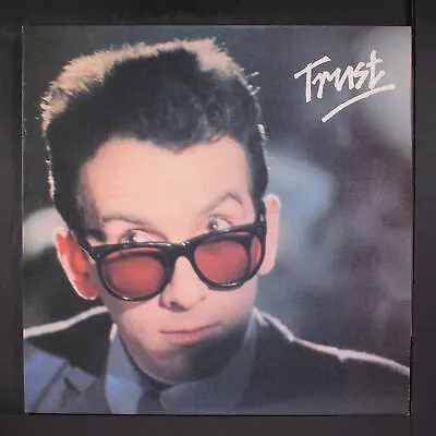 ELVIS COSTELLO & ATTRACTIONS: Trust COLUMBIA 12  LP 33 RPM • $10