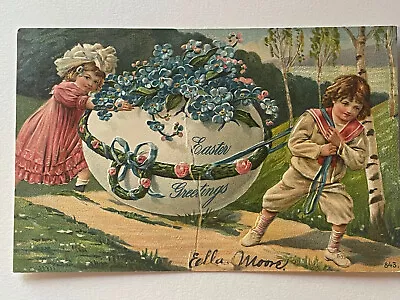 Vintage EASTER GREETINGS Boy & Girl Pulling Egg Flowers Trees 1908 Embossed Nice • $10