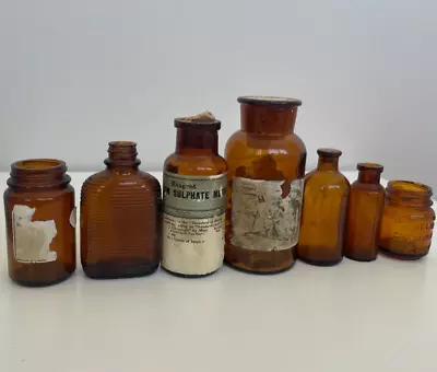 Lot 7 Antique Druggist Apothecary Amber Glass Bottles Merck Owens Armstrong Cork • $45