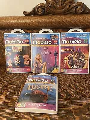 MobiGo Vtech Sealed Game Lot Of 4 Disney Dreamworks Educational Games  • $43.57