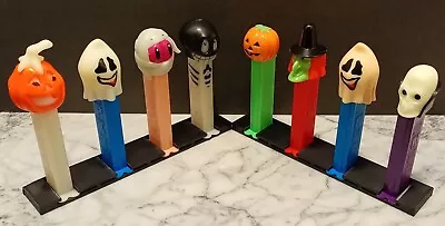 VTG LOT Of 8 Mixed Variety PEZ CANDY DISPENSERS W/Feet.   With 2 Display Stands. • $11.99