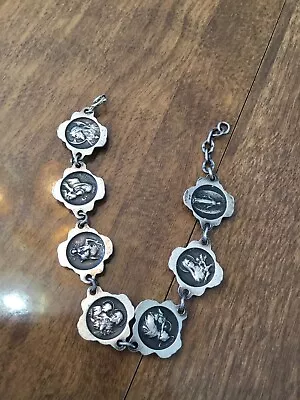 Sterling Silver Vintage 6” Reversible Rose Bud & Religious Bracelet • $100