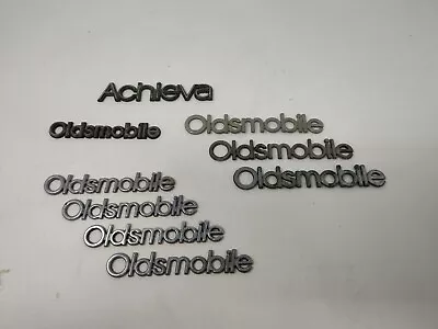 Lot Of 9: Oldsmobile Nameplate Emblems - Metal Plastic  Achieva - Vintage • $89.95