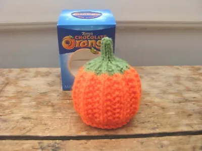 £2 • Buy Hand Knitted Pumpkin Chocolate Orange Cover, Orange & Green, Ziggy Knits