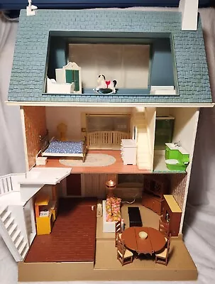 1980s Vintage Fisher Price Dollhouse With Dolls And Furniture. • $180