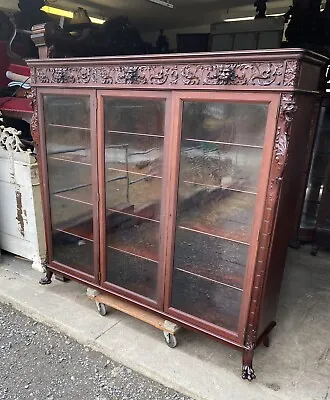 R. J. Horner Griffin Mahogany Carved Triple Door Bookcase • $5895