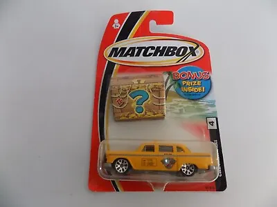 Matchbox Treasure Checker Taxi #4 New On Card • $4.99