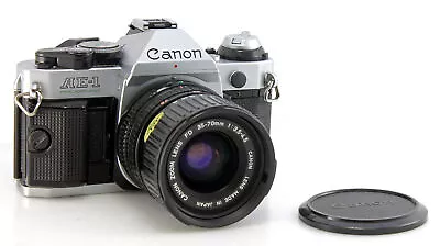Canon AE-1 Program SLR Film Camera + FD 35-70mm F3.5-4.5 Zoom Lens • £179