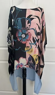 $198  IC COLLECTION Size  XL High Low Floral Poncho Top • $68