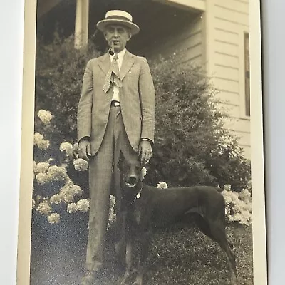 Vintage B&W Snapshot Photograph Man Smoking Pipe W/Hat & Dog Doberman Pinscher • $16.95