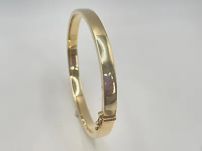 9ct Gold Hallmarked Hinged Plain Oval Bangle. Goldmine Jewellers. • £499