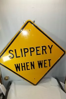 Vintage N.O.S Slippery When Wet Steel Embossed Sign 24 X24  Authentic Obsolete • $345