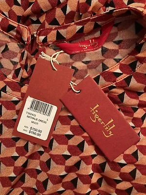 $60 • Buy  Tigerlily  BNWT NATHALIE Size Large Sleeveless Peephole Back Short Dress/belt