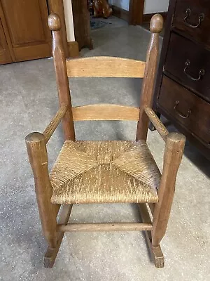 Vintage Solid Oak  Child Rocking Chair W Arms  And Rush Seat • $55