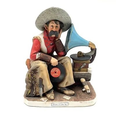 Vintage Cowboy Figurine With Weary Look Playing Old Records Norman Rockwell • $13.99