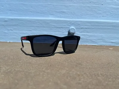 $160 • Buy Sunglasses - Prada Linea Rossa PS04XSBlack Rubber/Blue Lenses